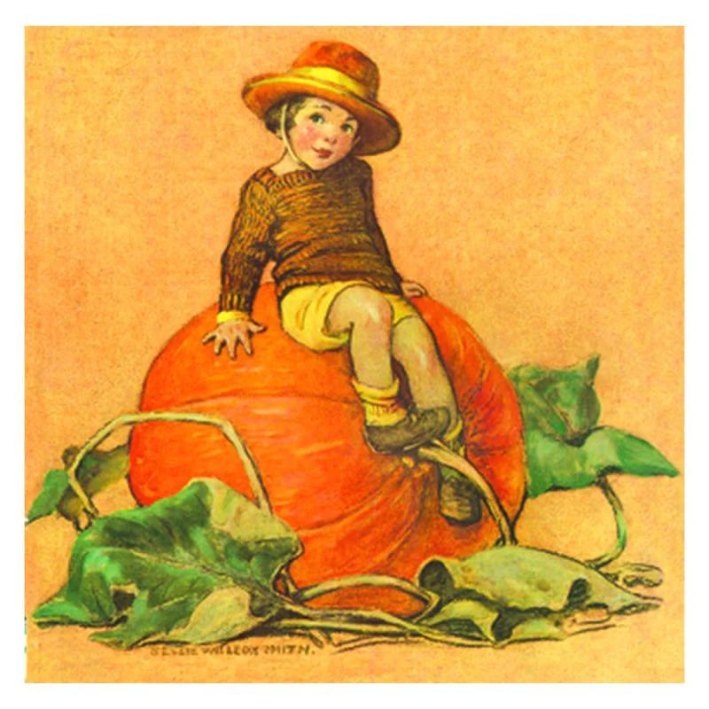 boy sitting on pumpkin